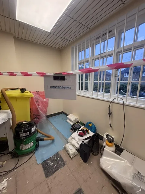 Asbestos floor tile and bitumen removal in South Woodford
